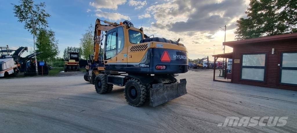 Hyundai Robex 140 W-9 حفارات بعجل