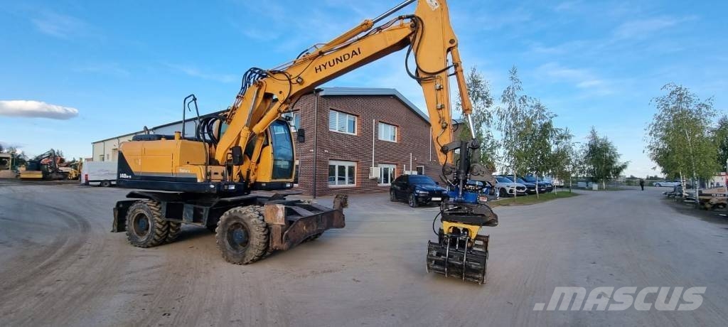 Hyundai Robex 140 W-9 حفارات بعجل