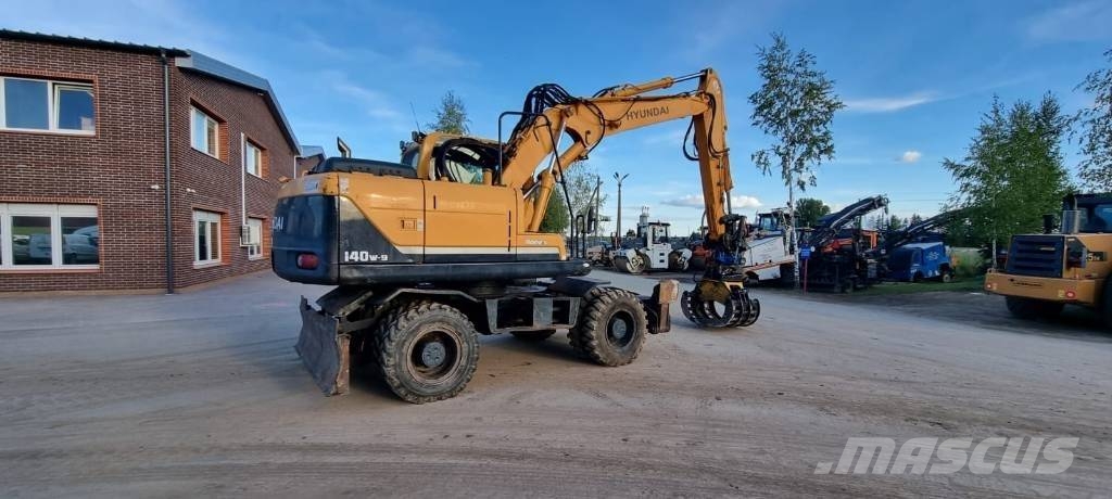Hyundai Robex 140 W-9 حفارات بعجل