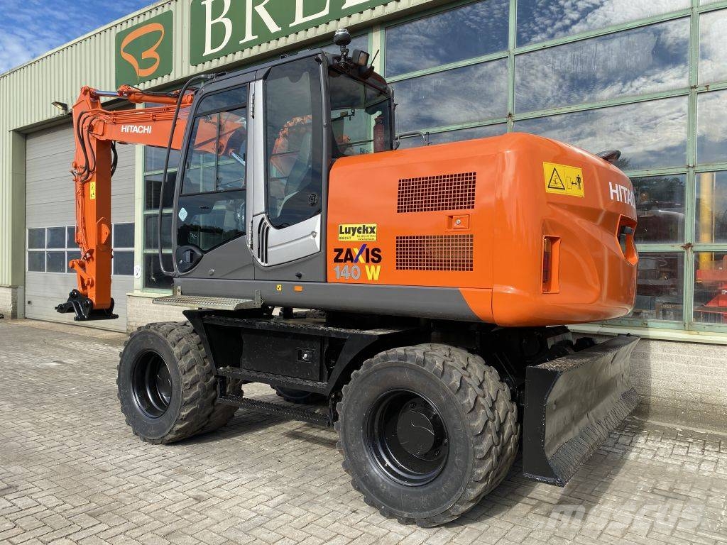 Hitachi ZX 140 W-3 حفارات بعجل