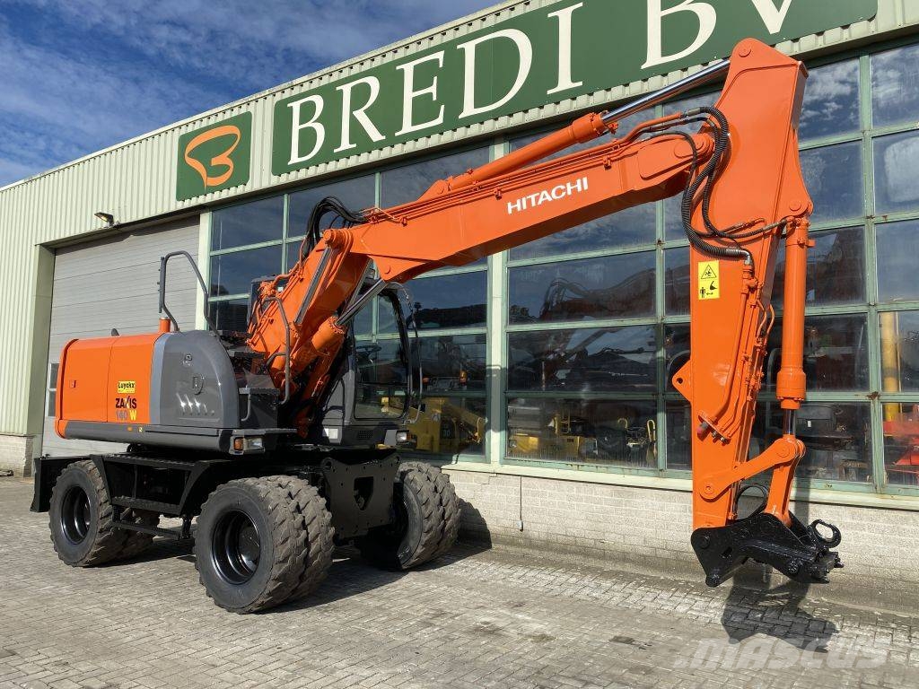 Hitachi ZX 140 W-3 حفارات بعجل