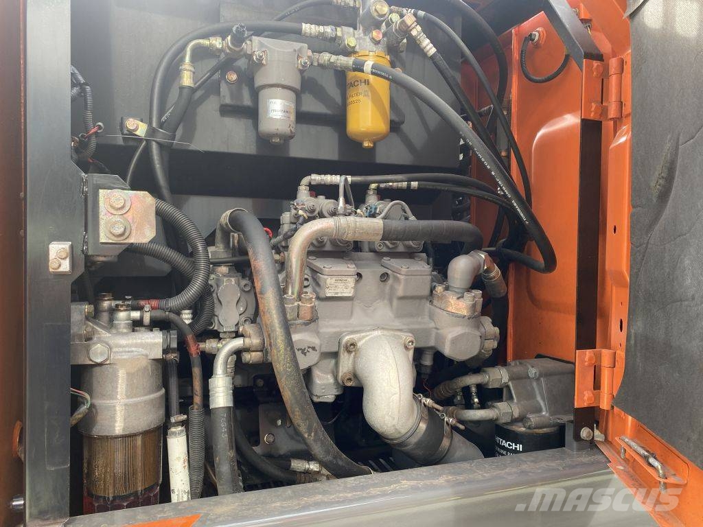 Hitachi ZX 140 W-3 حفارات بعجل
