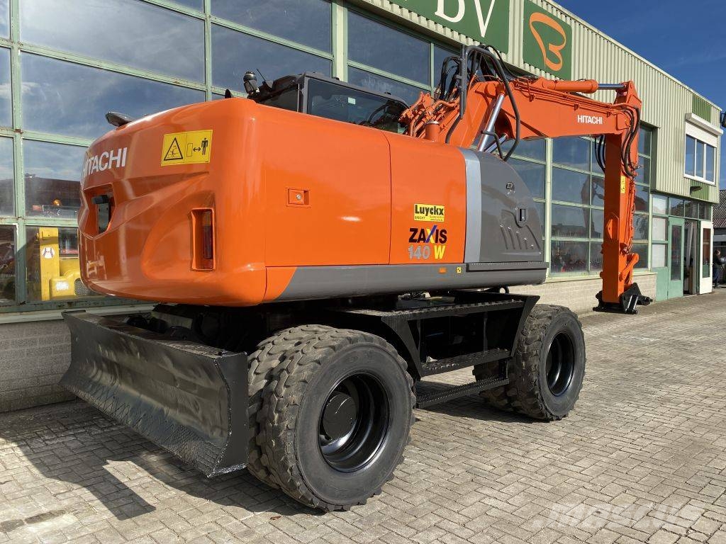 Hitachi ZX 140 W-3 حفارات بعجل