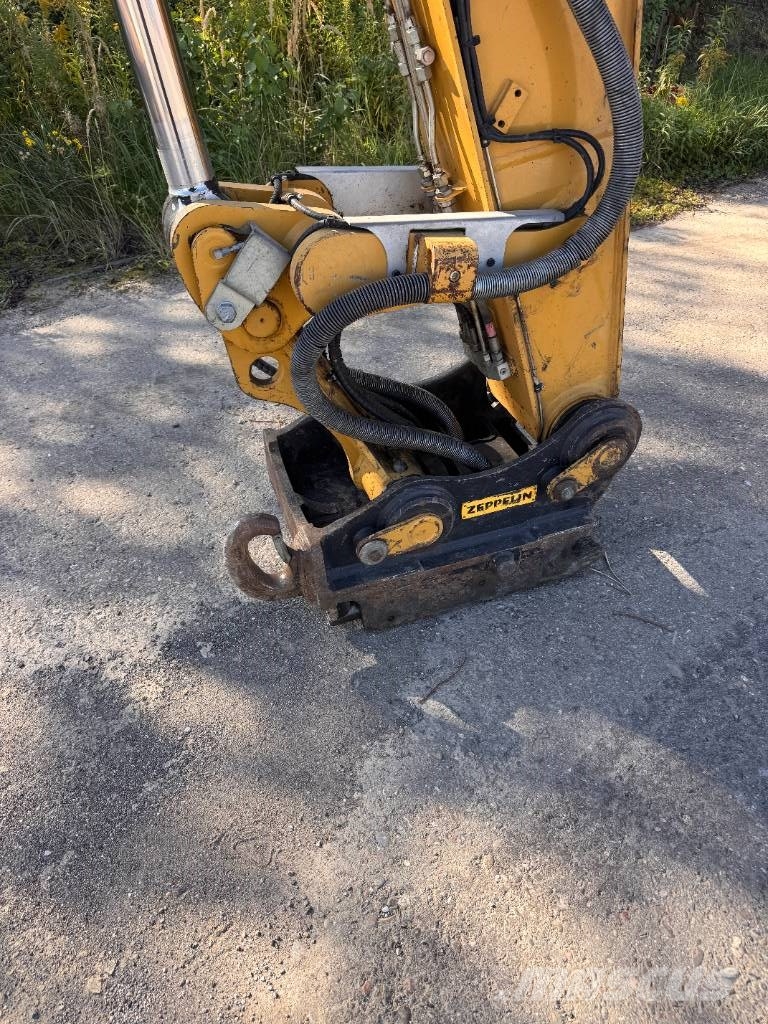 CAT M 320 F Ekskavatori uz riteņiem