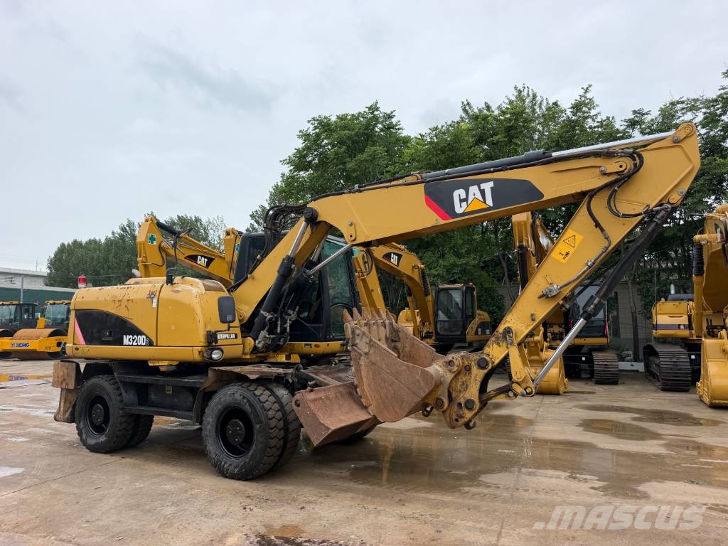 CAT M320D2 wheel digger 휠 굴삭기