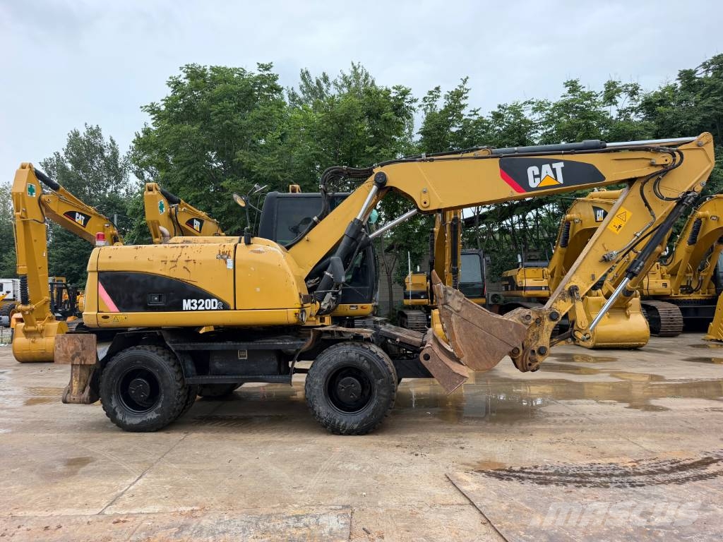 CAT M320D2 wheel digger 휠 굴삭기