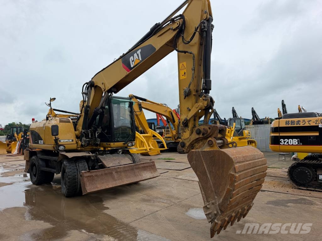 CAT M320D2 wheel digger 휠 굴삭기