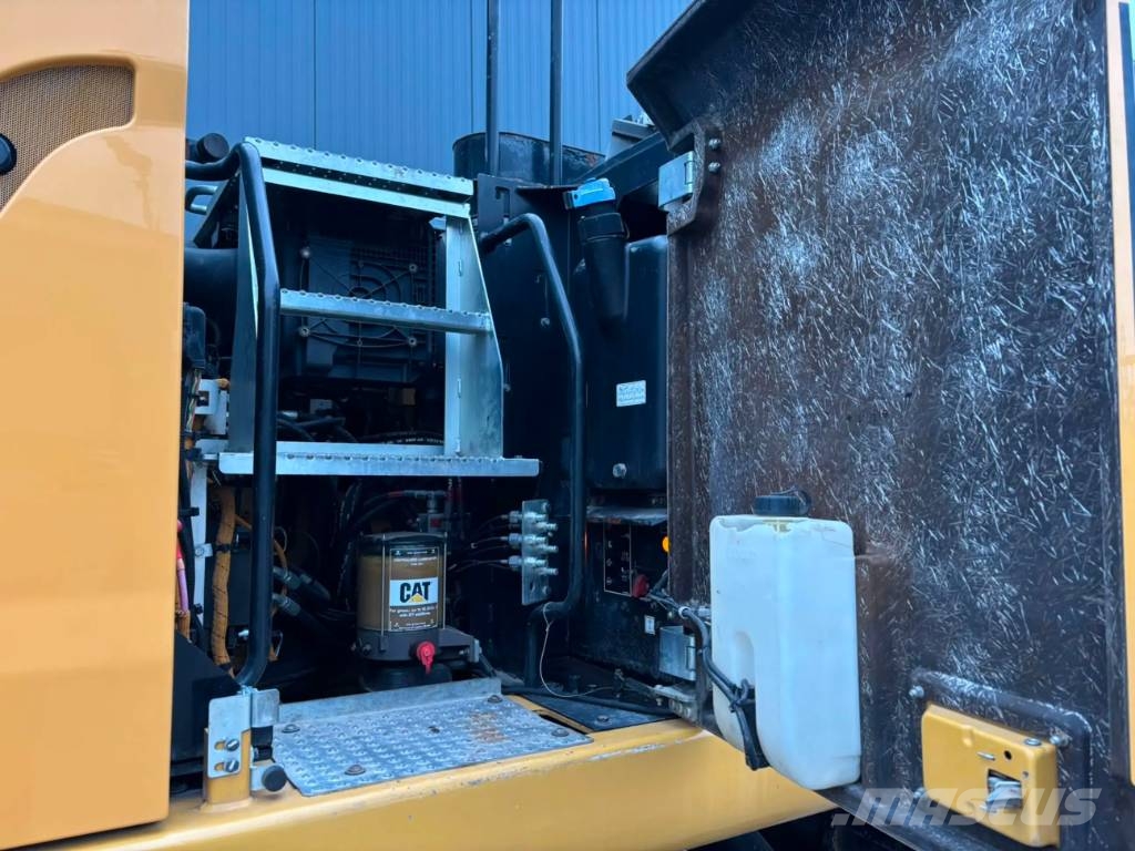 CAT M320F Pelle sur pneus