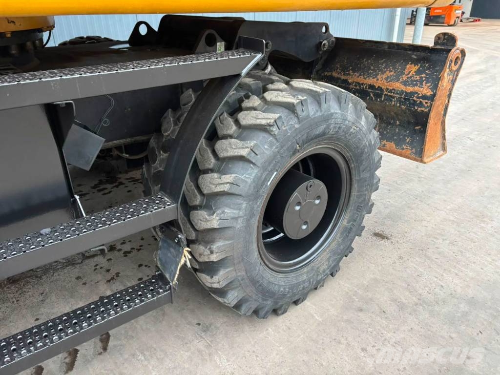 CAT M320F Pelle sur pneus
