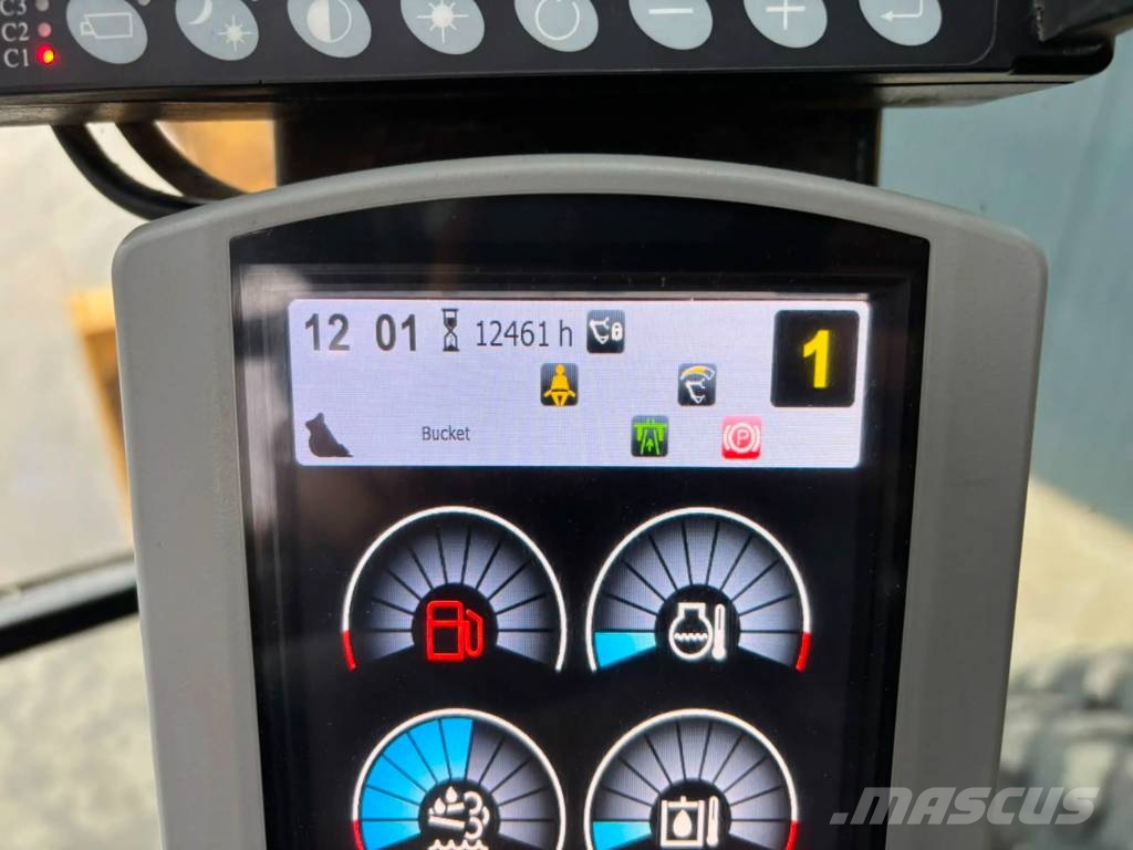 CAT M320F Pelle sur pneus