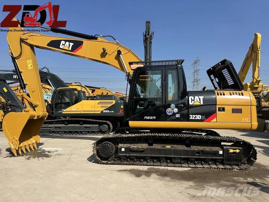 CAT 323 Kāpurķēžu ekskavatori