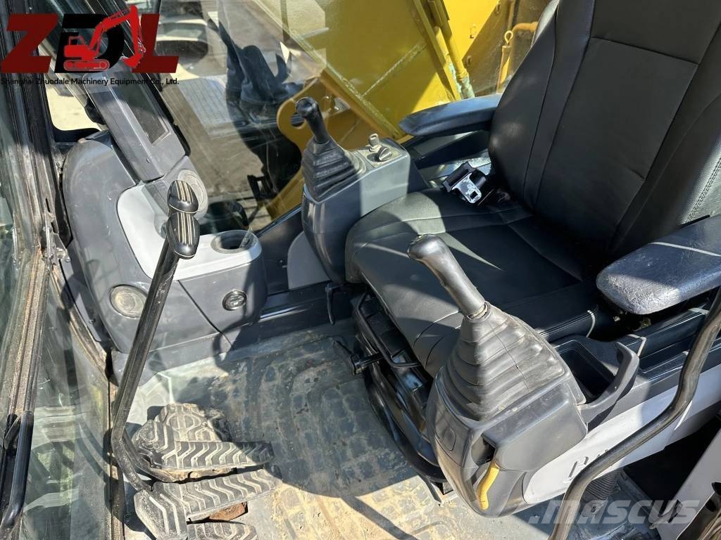 CAT 323 Kāpurķēžu ekskavatori