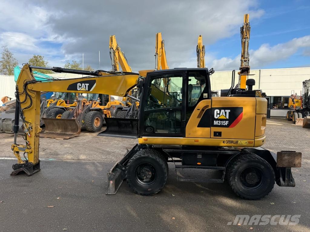 CAT M315F Ekskavatori uz riteņiem