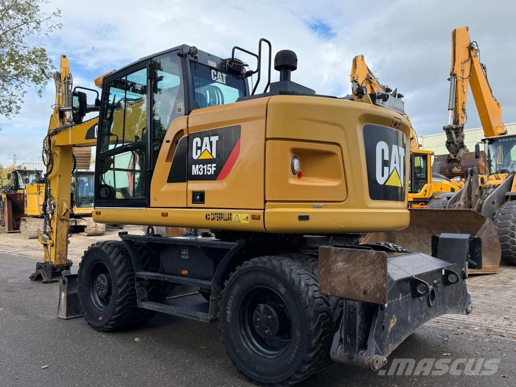 CAT M315F Ekskavatori uz riteņiem