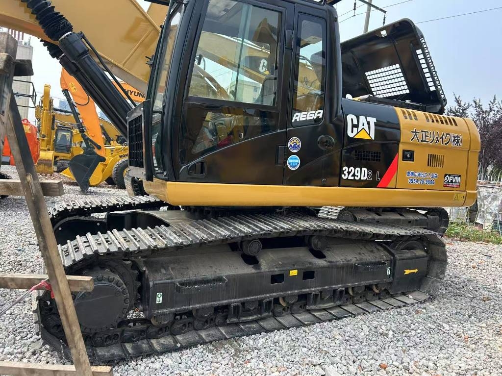 CAT 329D2L Materialumschlag