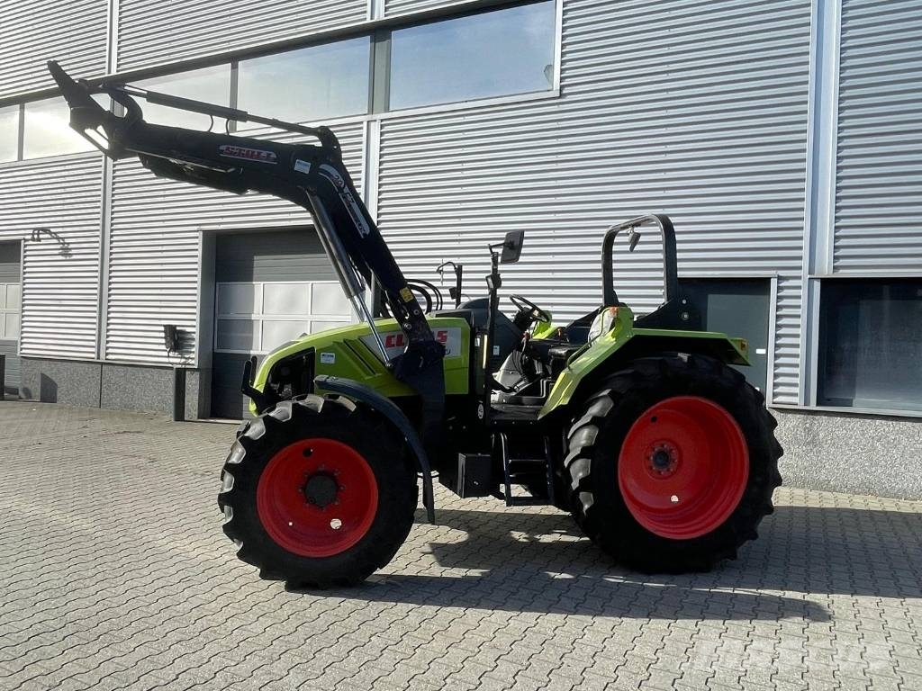 CLAAS Axos 340 tractor met Stoll voorlader Трактори