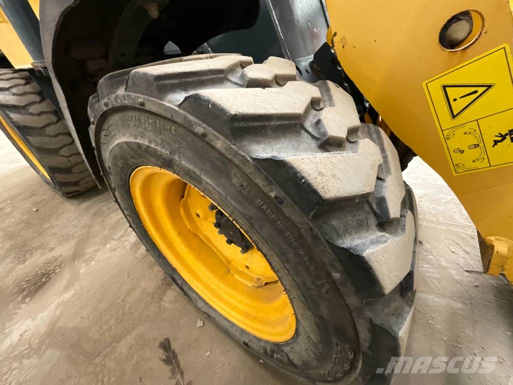 Gehl 140 لوادر بعجل