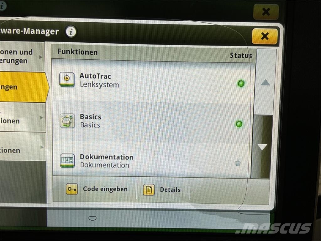 John Deere 6215R الجرارات