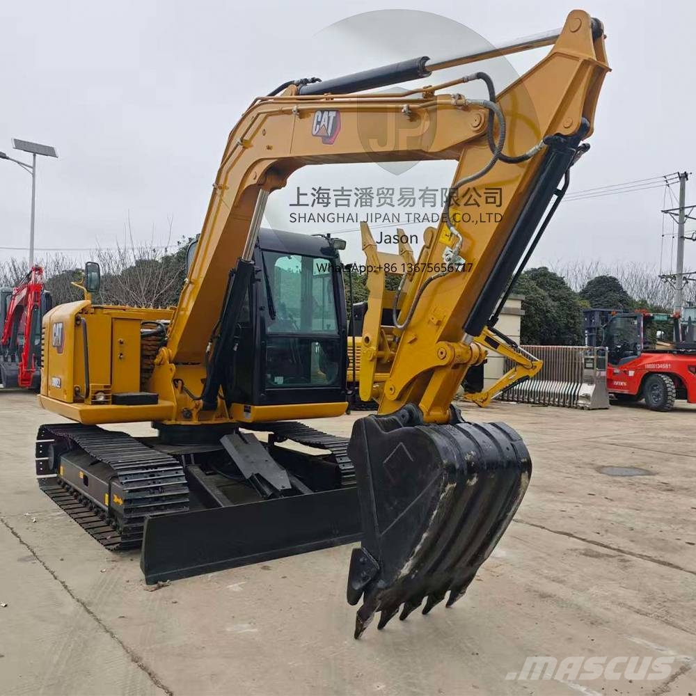 CAT 308 E Середні екскаватори 7т. - 12т.
