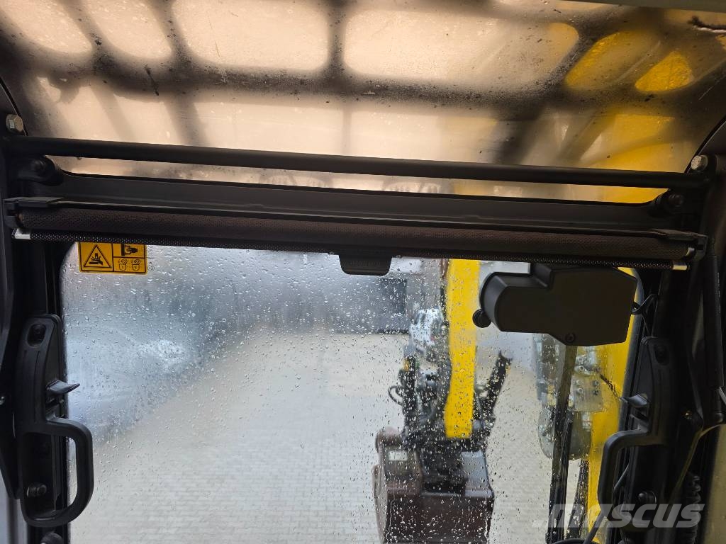 Wacker Neuson EW 100 حفارات بعجل