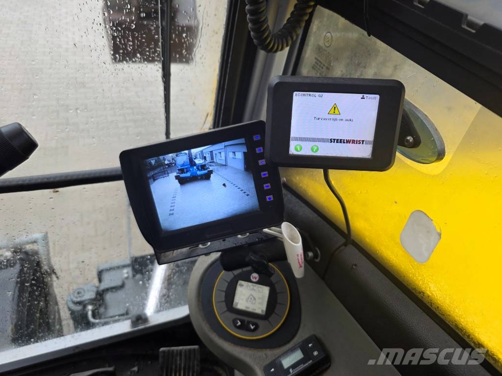 Wacker Neuson EW 100 حفارات بعجل