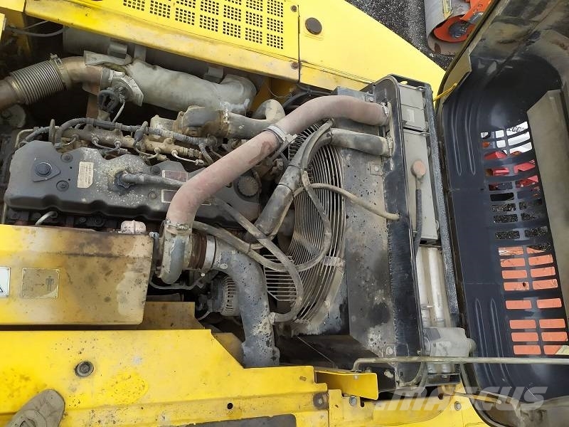 New Holland E 265 C حفارات زحافة