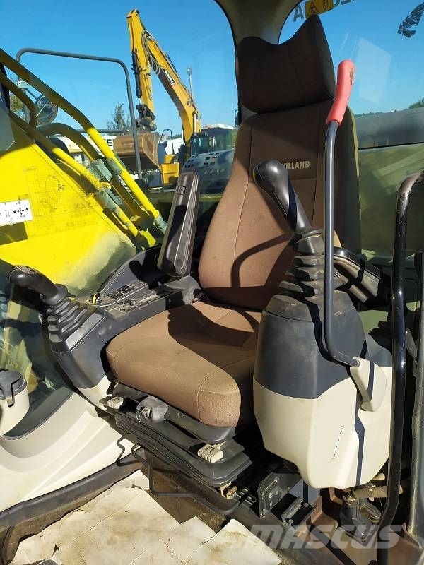 New Holland E 265 C حفارات زحافة
