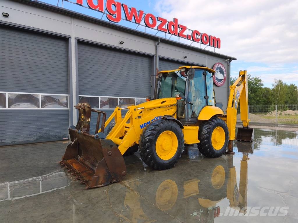 Komatsu WB97S-5E0 لوادر ذات جرافات عكسية