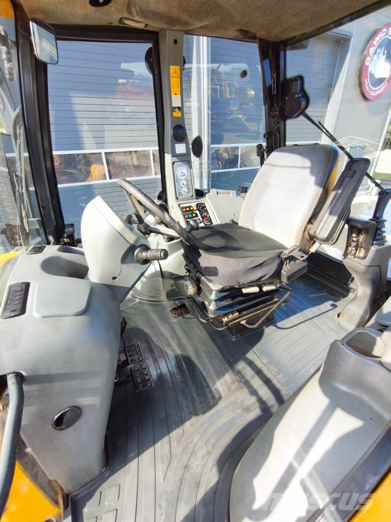 Komatsu WB97S-5E0 لوادر ذات جرافات عكسية