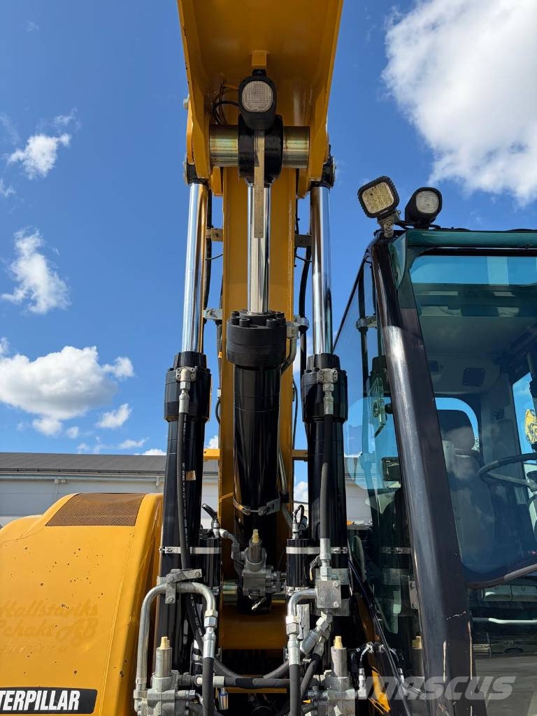 CAT M 315 D حفارات بعجل