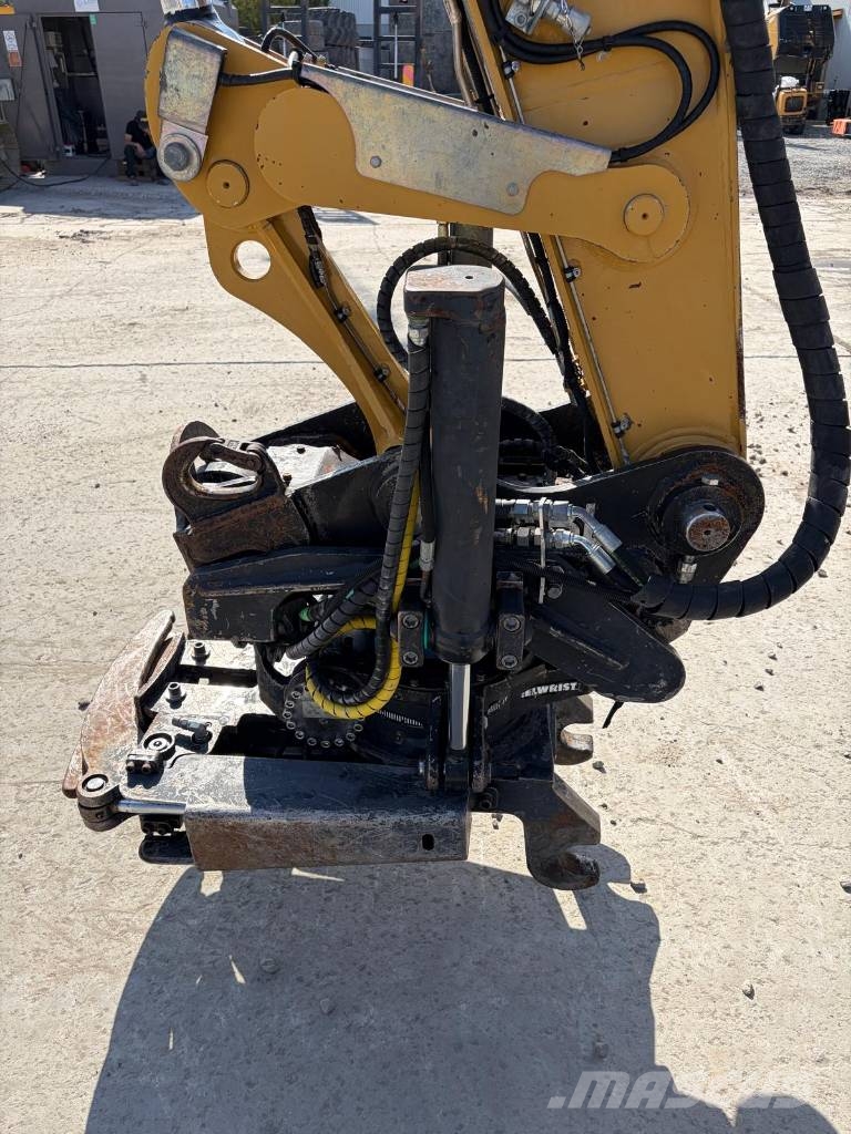 CAT M 315 D حفارات بعجل