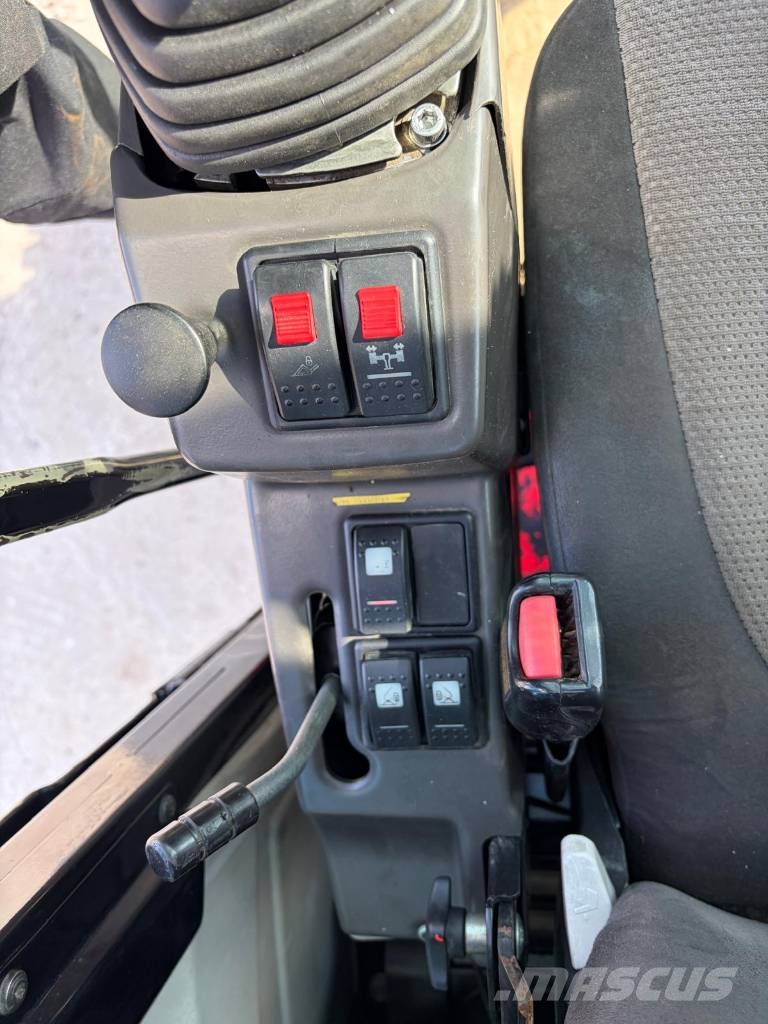 CAT M 315 D حفارات بعجل