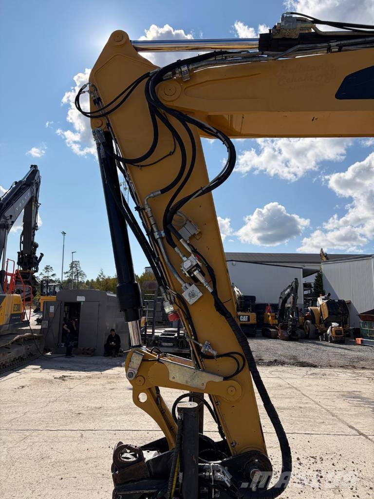 CAT M 315 D حفارات بعجل