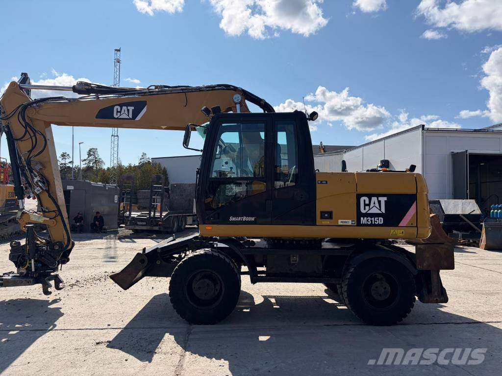 CAT M 315 D حفارات بعجل