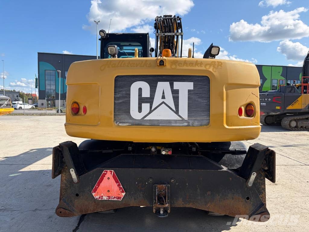 CAT M 315 D حفارات بعجل