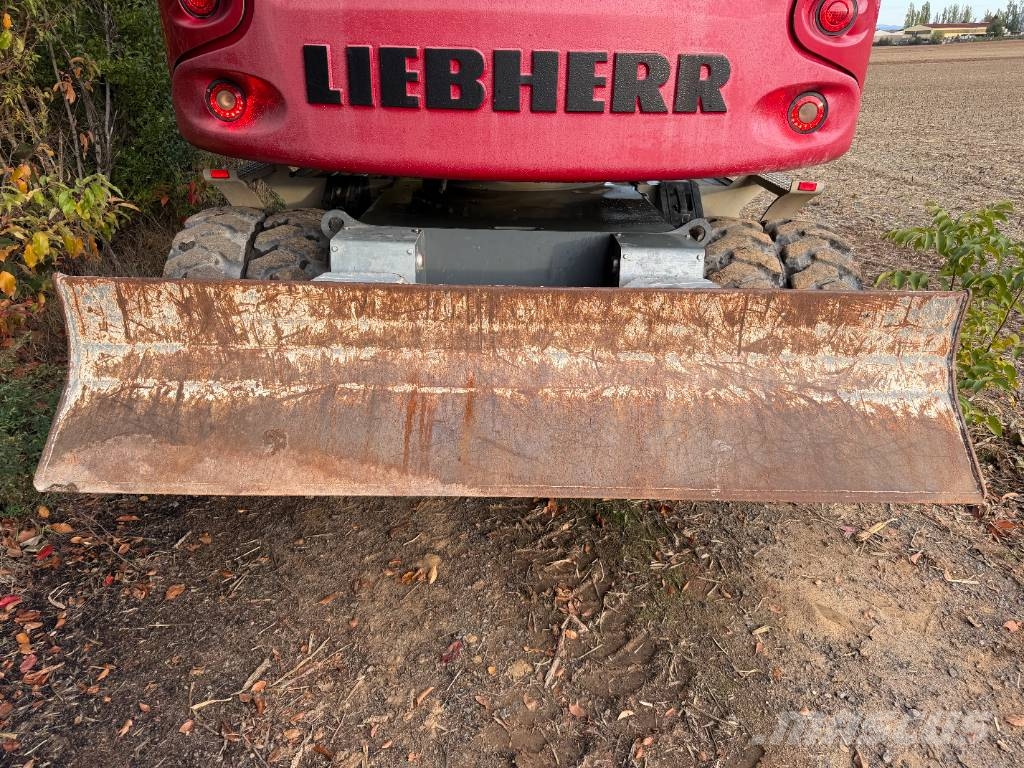 Liebherr 914 Compact Litronic 1er Main حفارات بعجل