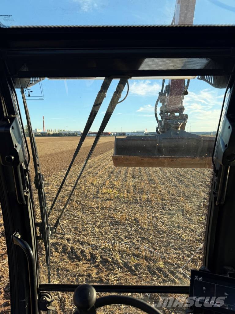 Liebherr 914 Compact Litronic 1er Main حفارات بعجل