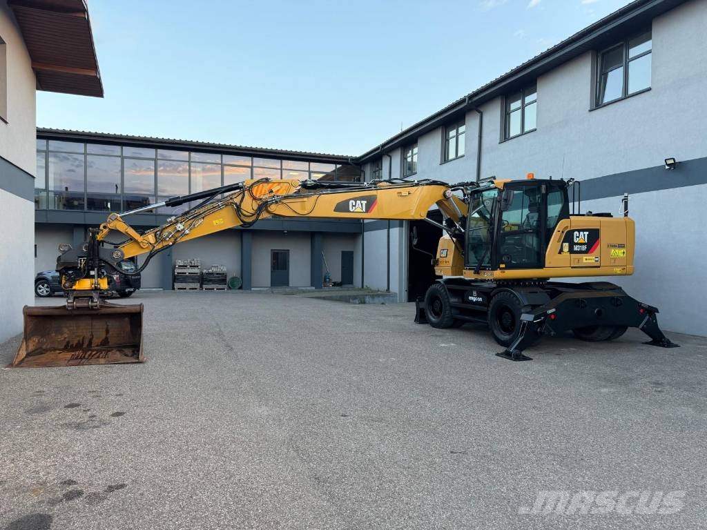 CAT M 318 F Bagri na kolesih