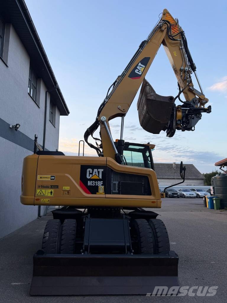CAT M 318 F Bagri na kolesih
