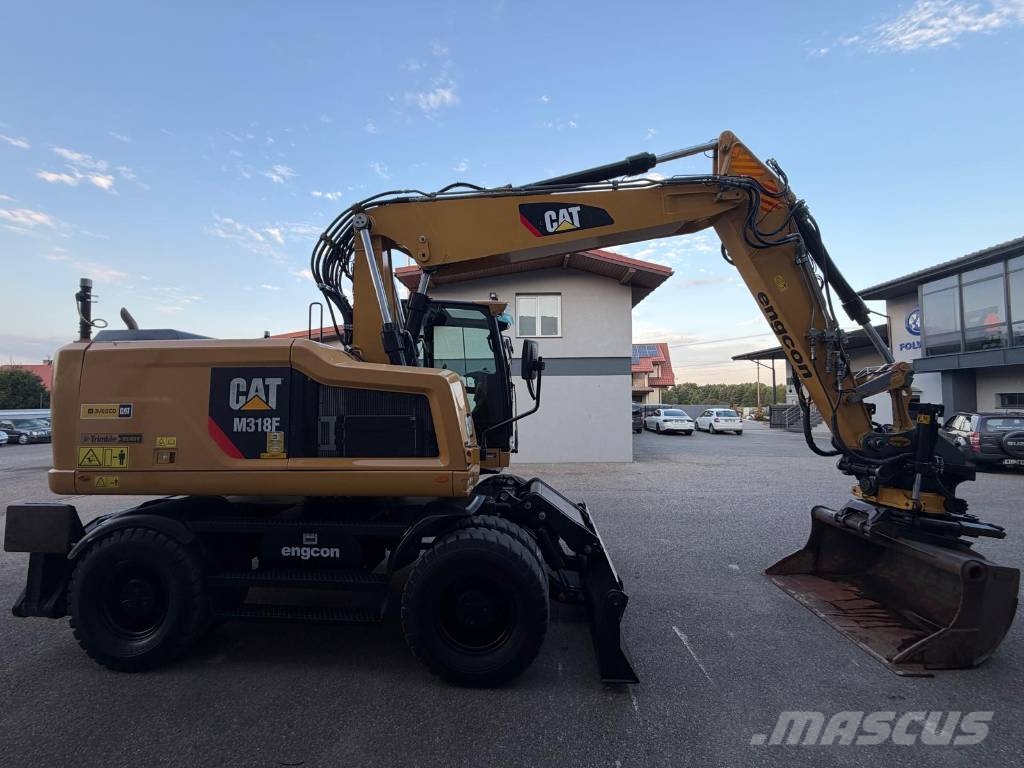 CAT M 318 F Bagri na kolesih
