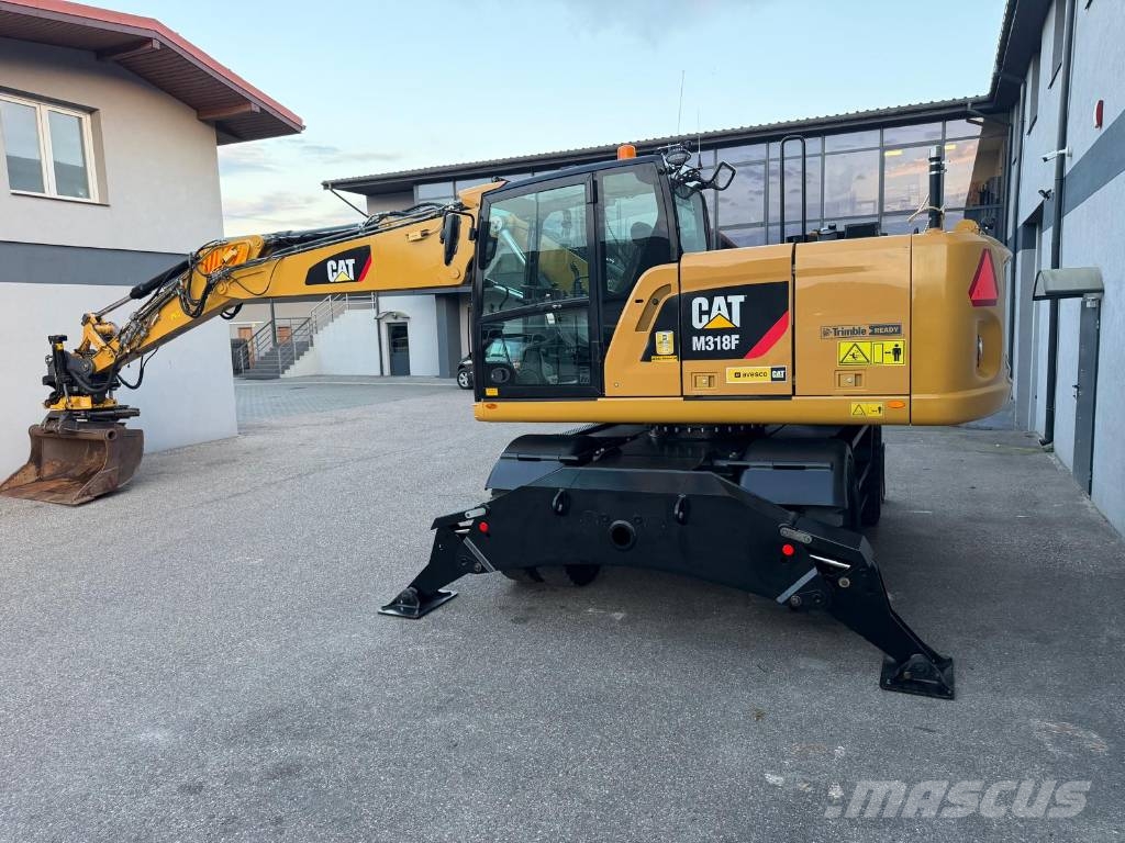 CAT M 318 F Bagri na kolesih