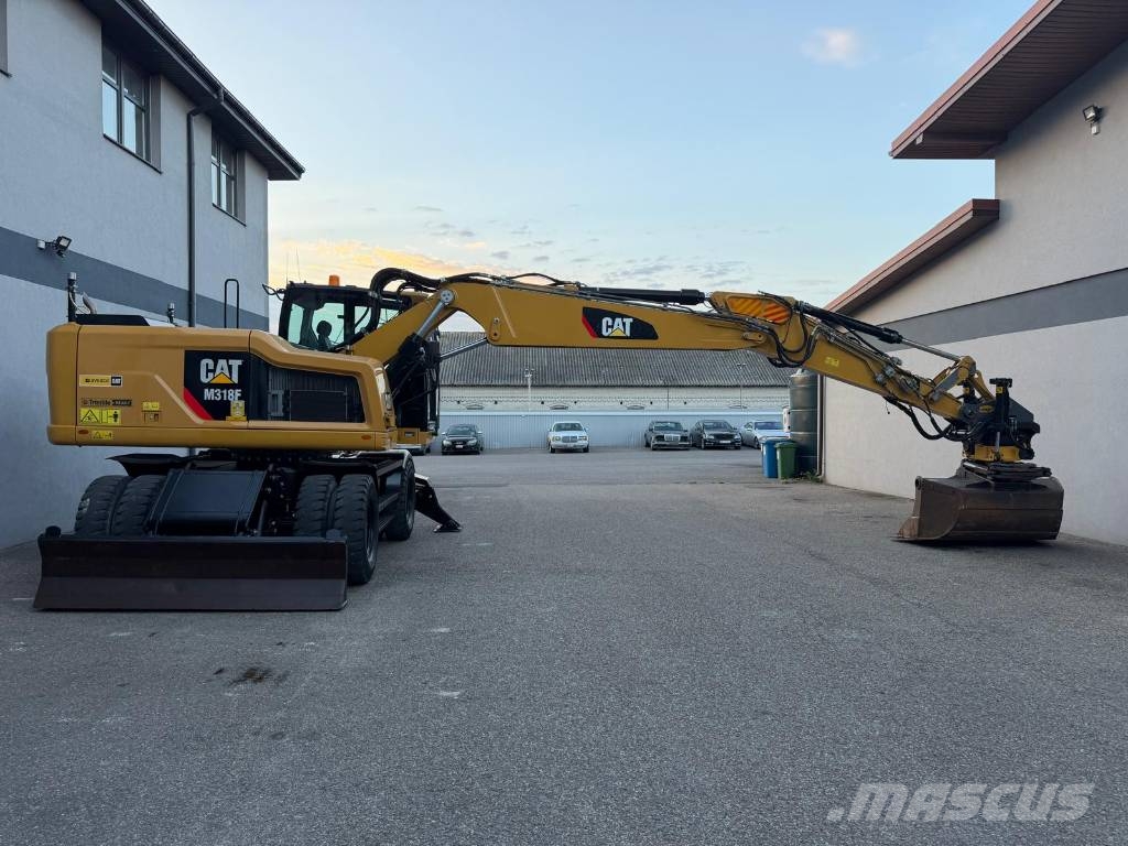 CAT M 318 F Bagri na kolesih