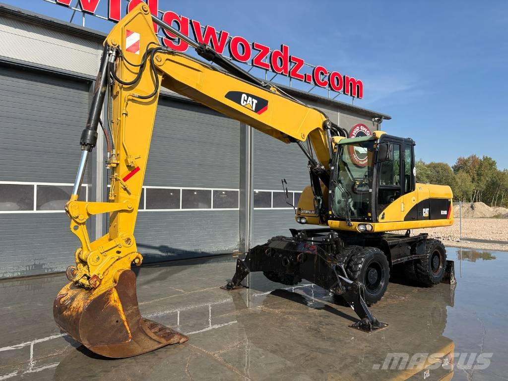 CAT M 318 D Колёсные экскаваторы