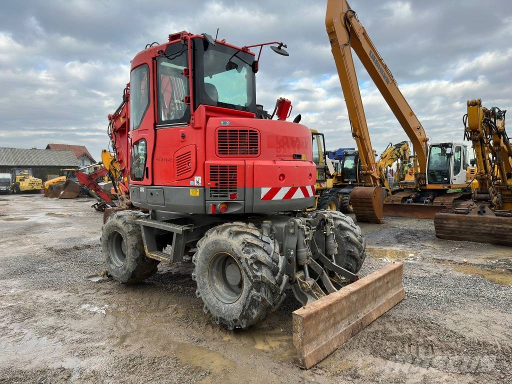 Komatsu PW98MR-8 Колісні екскаватори