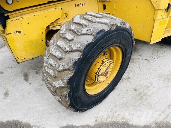 John Deere 310K Rovokopači