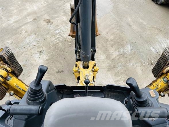 John Deere 310K Rovokopači