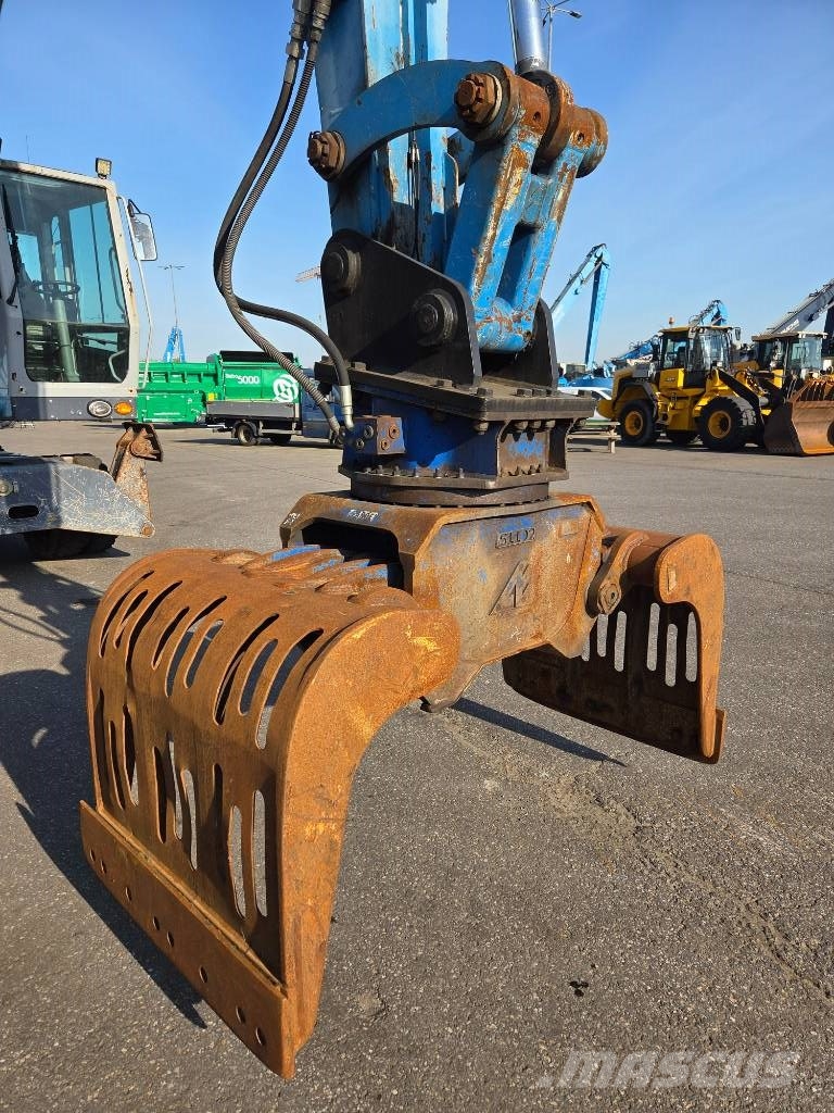 Fuchs MHL 331 E مناولات المخلفات / مناولات صناعية