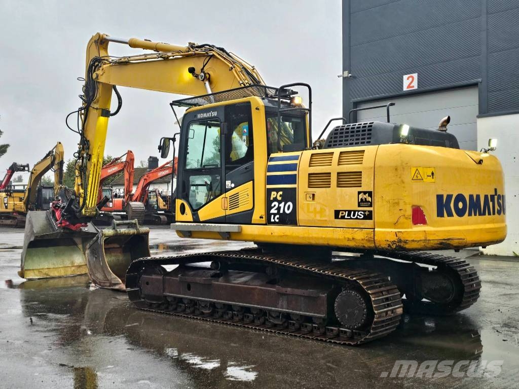 Komatsu PC 210 LC-10 Beltegraver