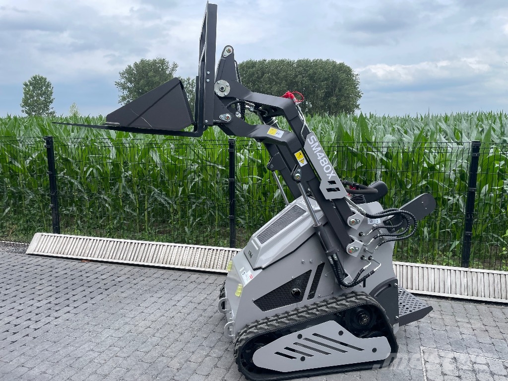  Skidmate Skidster لوادر انزلاقية التوجيه