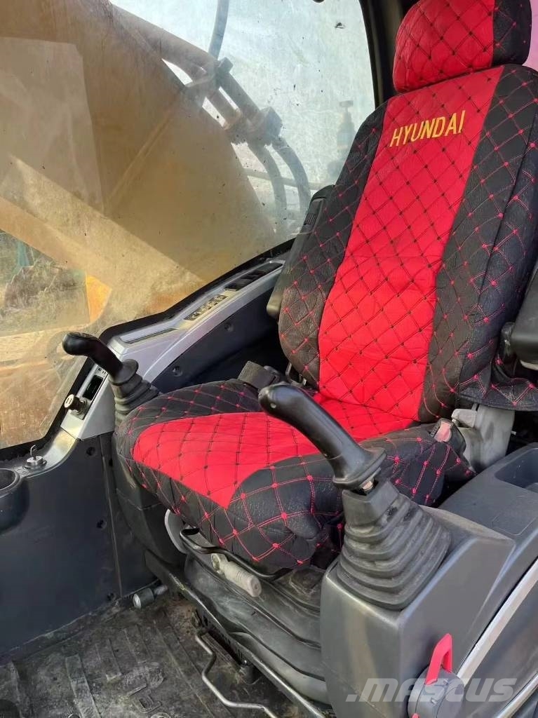 Hyundai Robex 520 VS حفارات زحافة